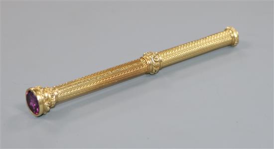 An early 20th century Sampson Mordan & Co yellow metal overlaid propelling pencil, with foil backed stone terminal, 81mm.